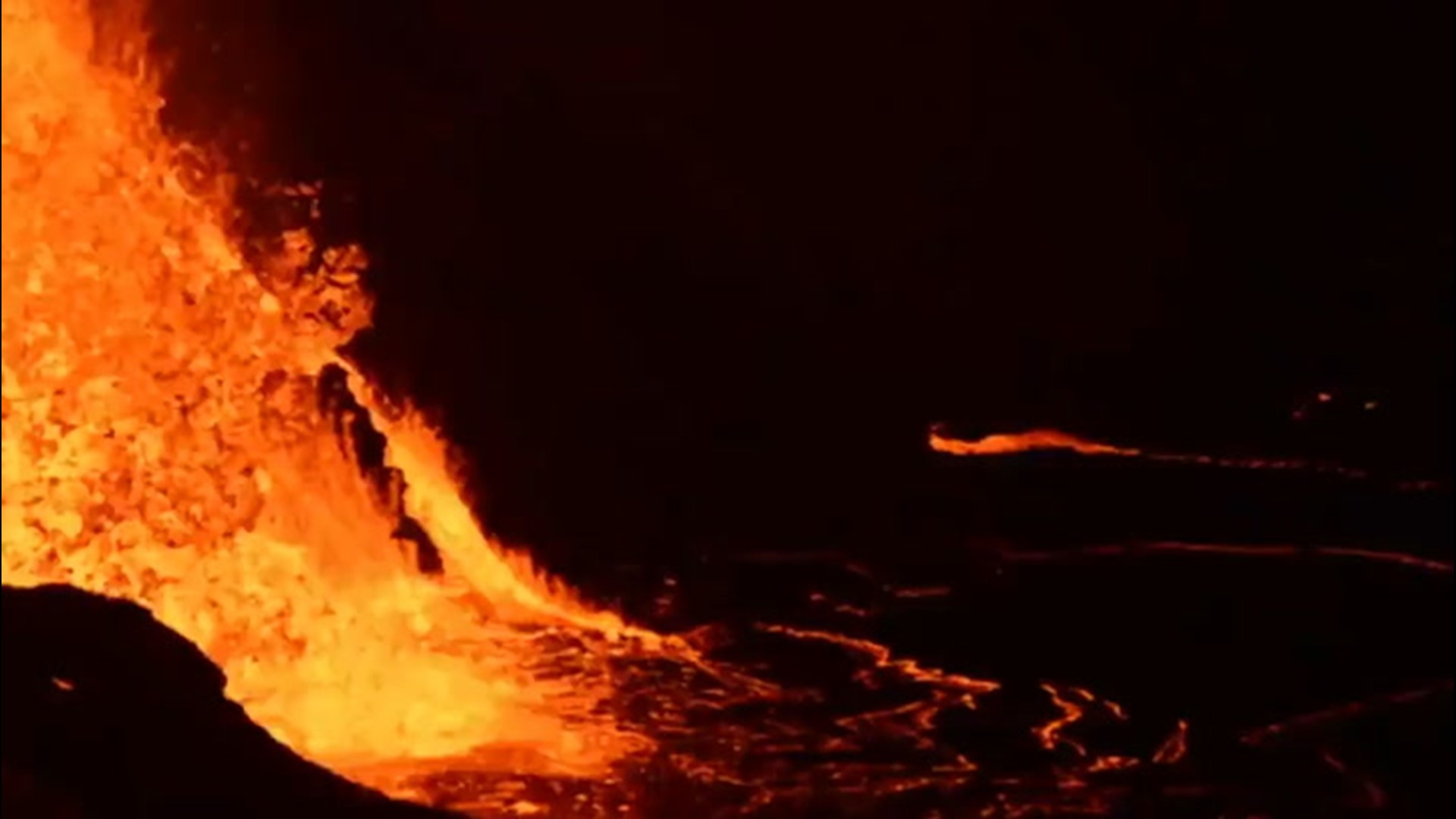 Lava glows at night during the Kilauea eruption on Dec. 22, on the big island of Hawaii. The U.S. Geological Survey captured this video of the lava 'fountaining' early in the morning.