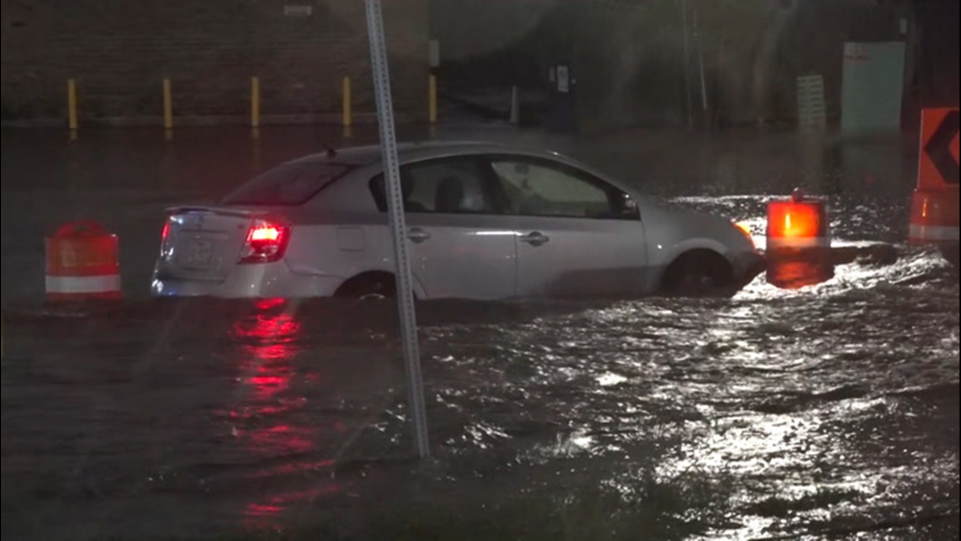 Dozens of drivers got stuck on flooded streets as Tropical Storm Beta dumped roughly a foot of rain in the Houston and Galveston areas.