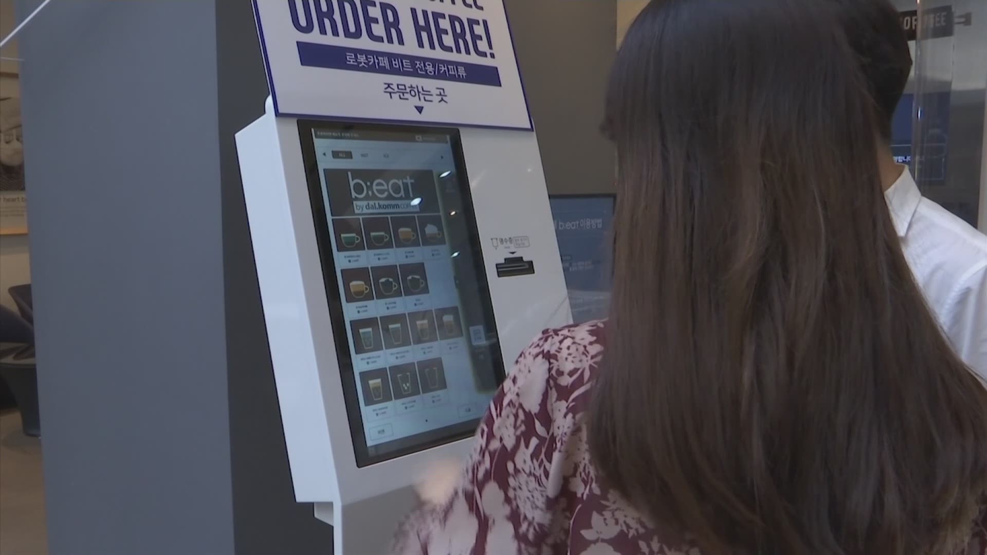 Coffee shops run by robots, rather than human baristas, are emerging across South Korea. (AP)