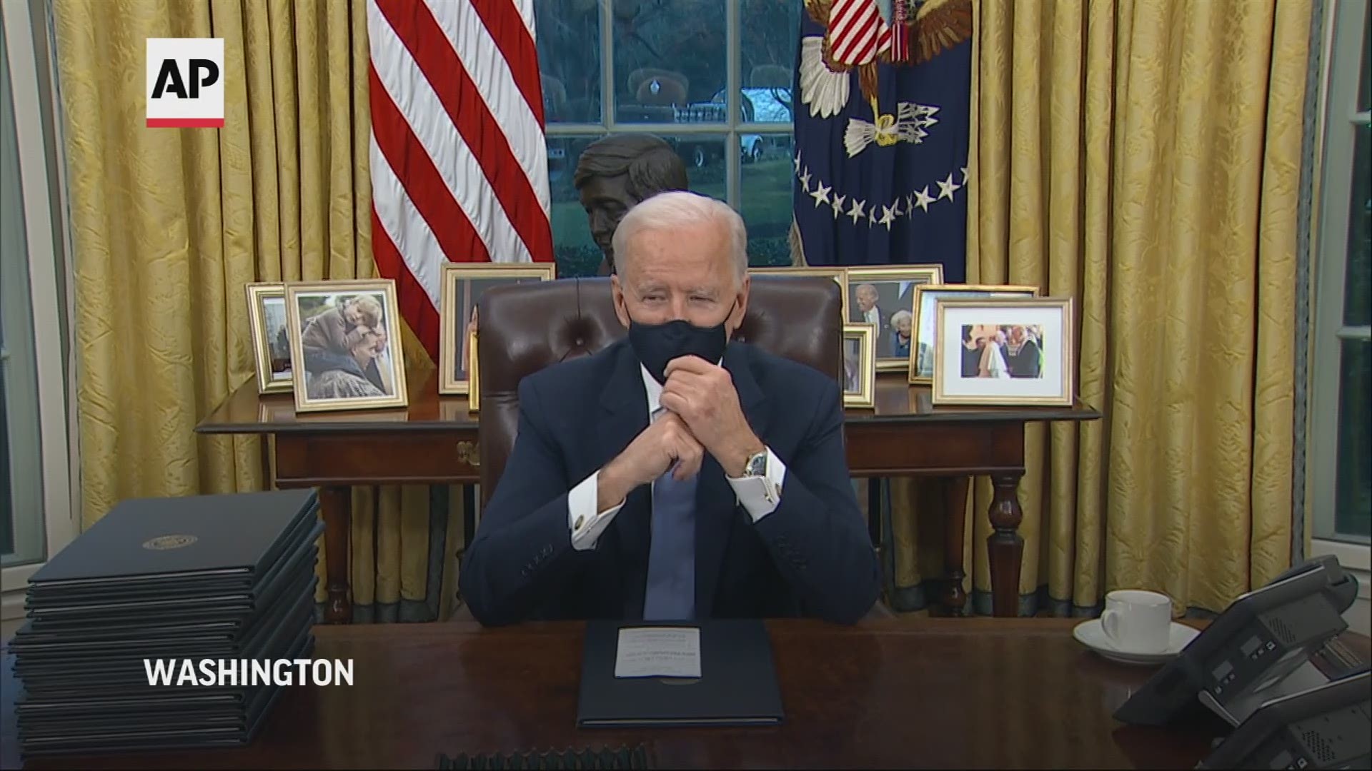 In his first hours as president, Joe Biden struck at the heart of President Donald Trump’s policy legacy, signing executive actions that reverse his predecessor.