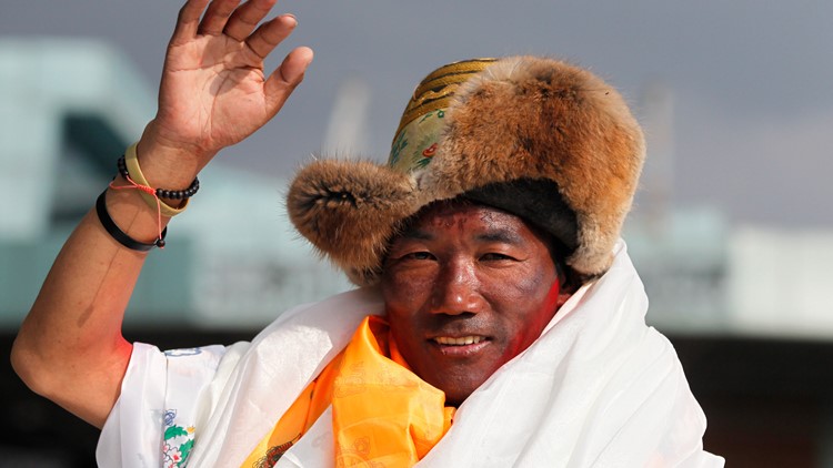 Sherpa guide breaks own record scaling Everest for 26th time