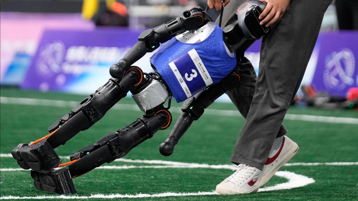 Photos of Beijing’s World Humanoid Robot Games show how a human touch is still needed