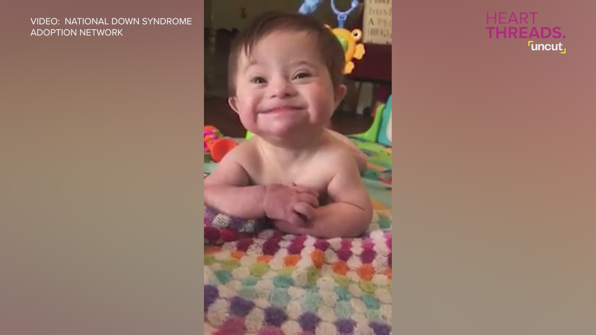 This little girl's infectious smile will brighten your day.