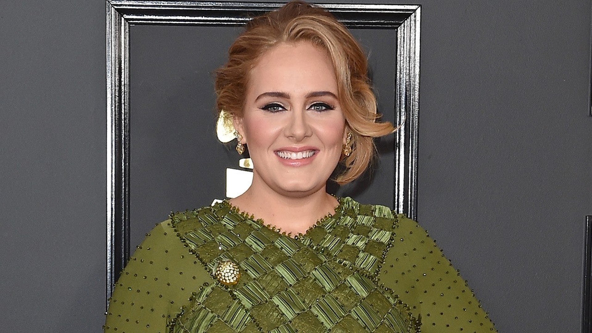 Adele Accused Of Cultural Appropriation For Wearing Jamaican Flag