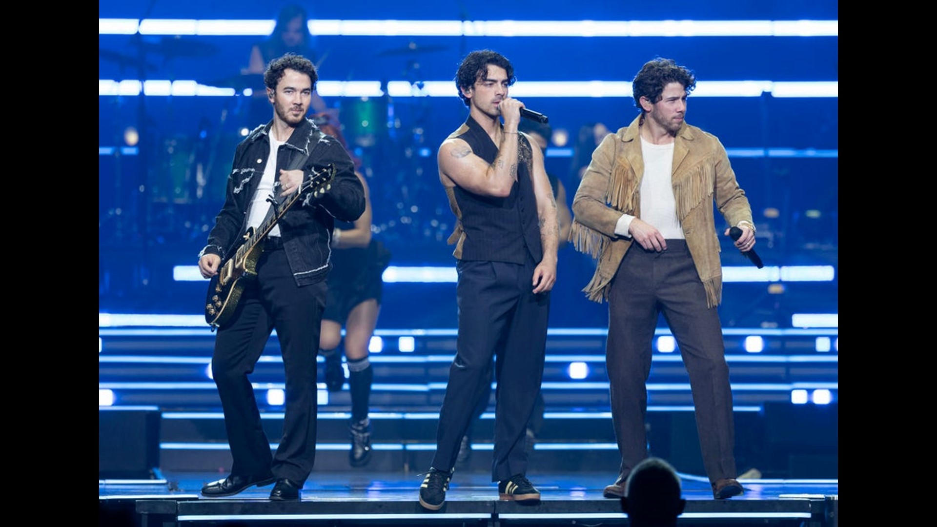 Joe Jonas Tears Up Singing 'Little Bird' While His Daughters Attend