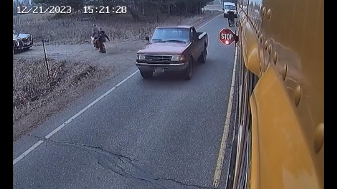 Woman charged after near crash with children leaving school bus | wfaa.com