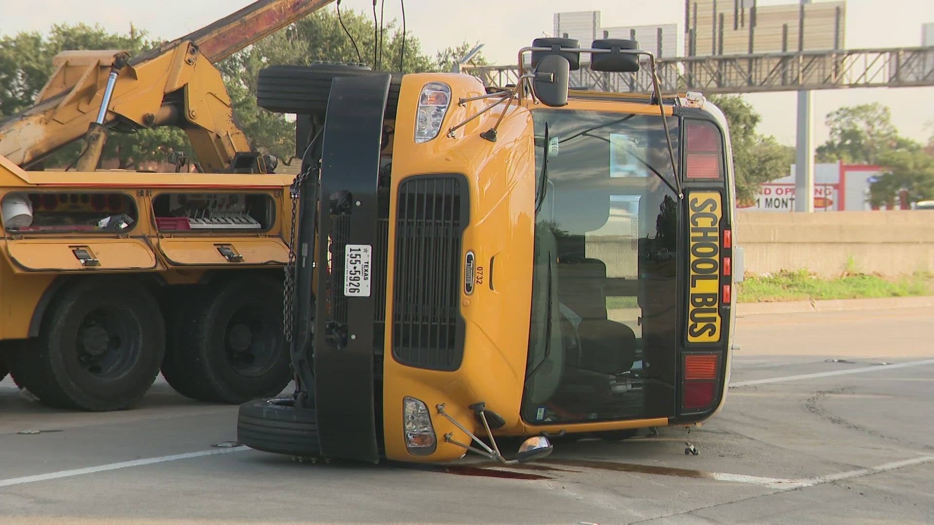 The HISD bus flipped over Wednesday morning after colliding with a vehicle on Berkley near the South Loop.