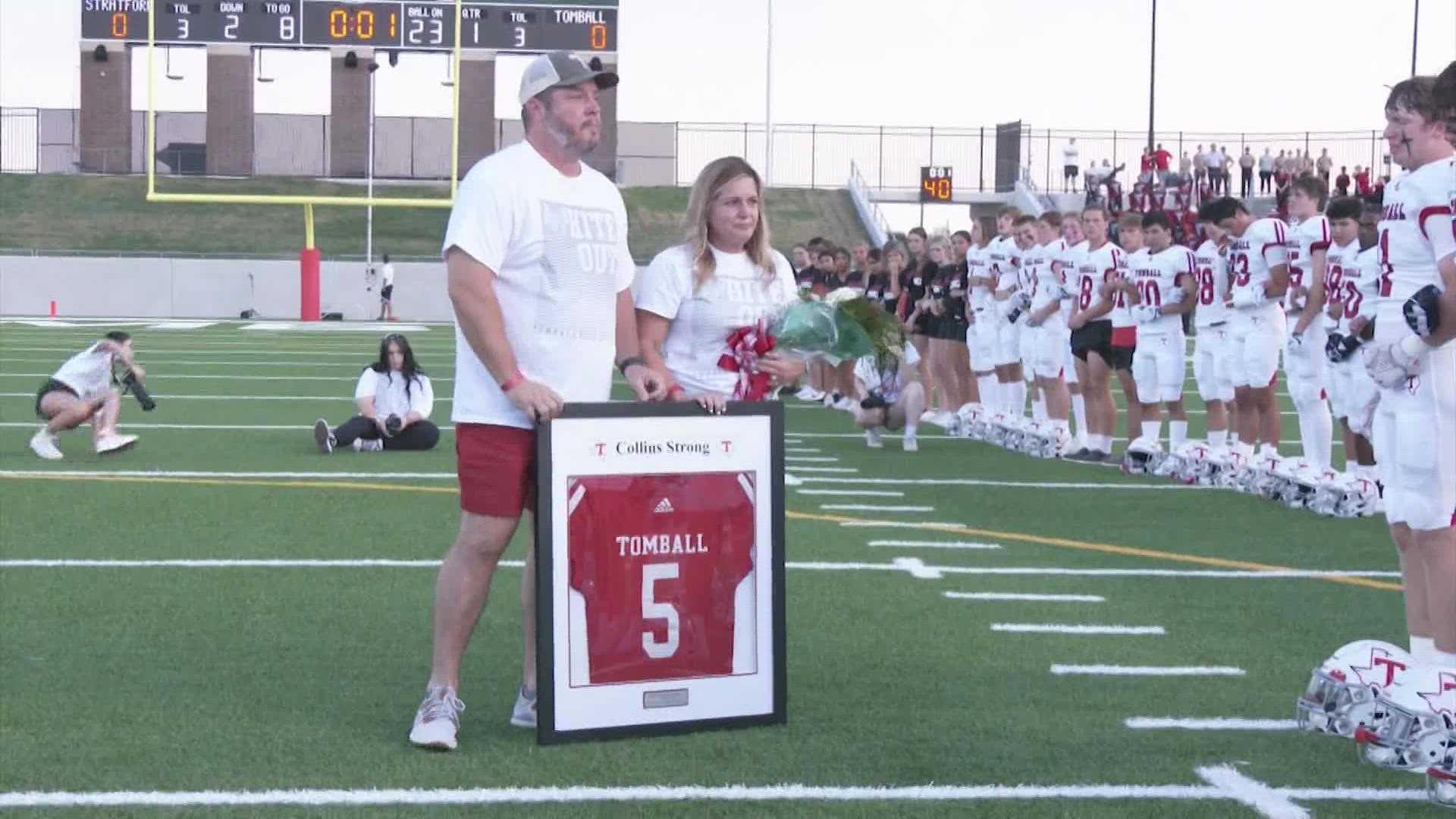 The school honored Carson Collins' family by presenting his parents with a jersey. Carson was one of five killed by escaped inmate Gonzalo Lopez.