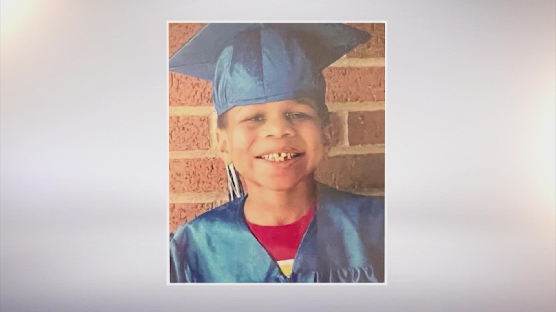 After being questioned by detectives all day Thursday, the adoptive father of a Spring boy found dead in a washing machine was dropped off at his home.
