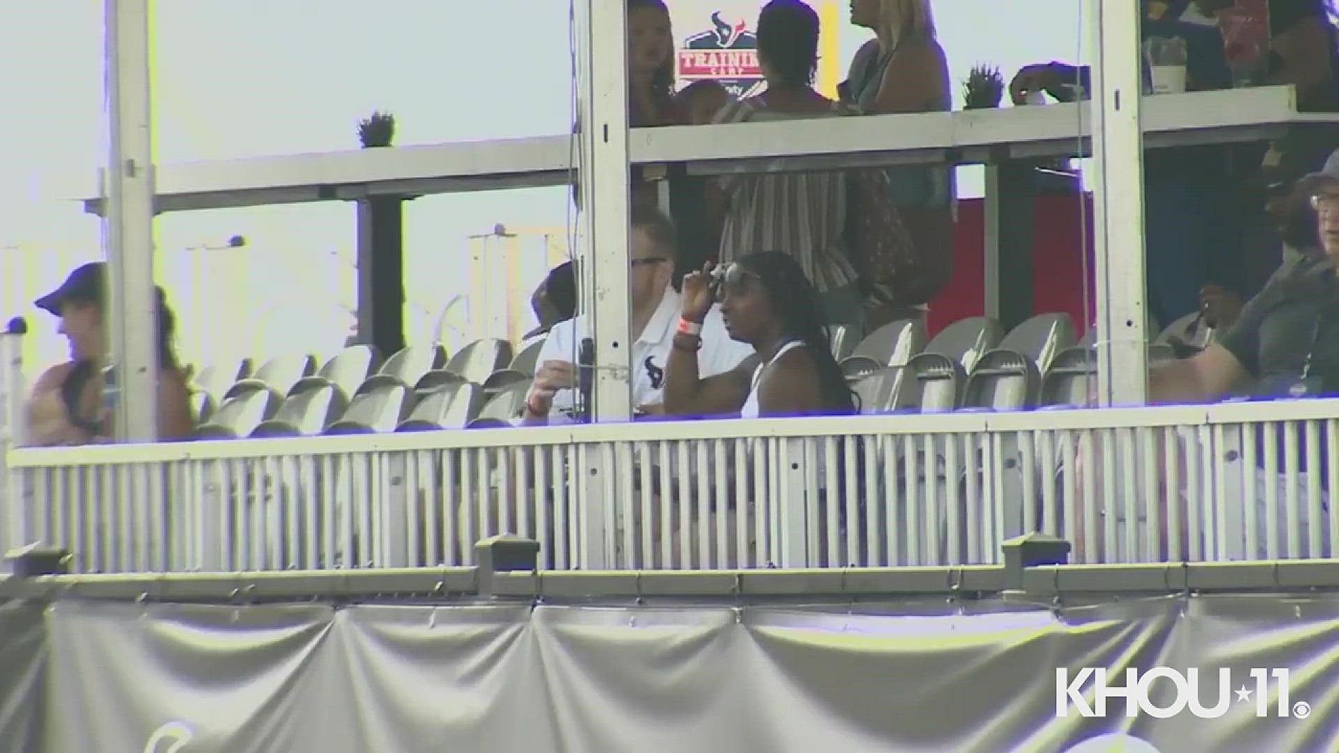 A day after returning home from the Tokyo Olympics, star gymnast Simone Biles visited Houston Texans training camp Friday morning.