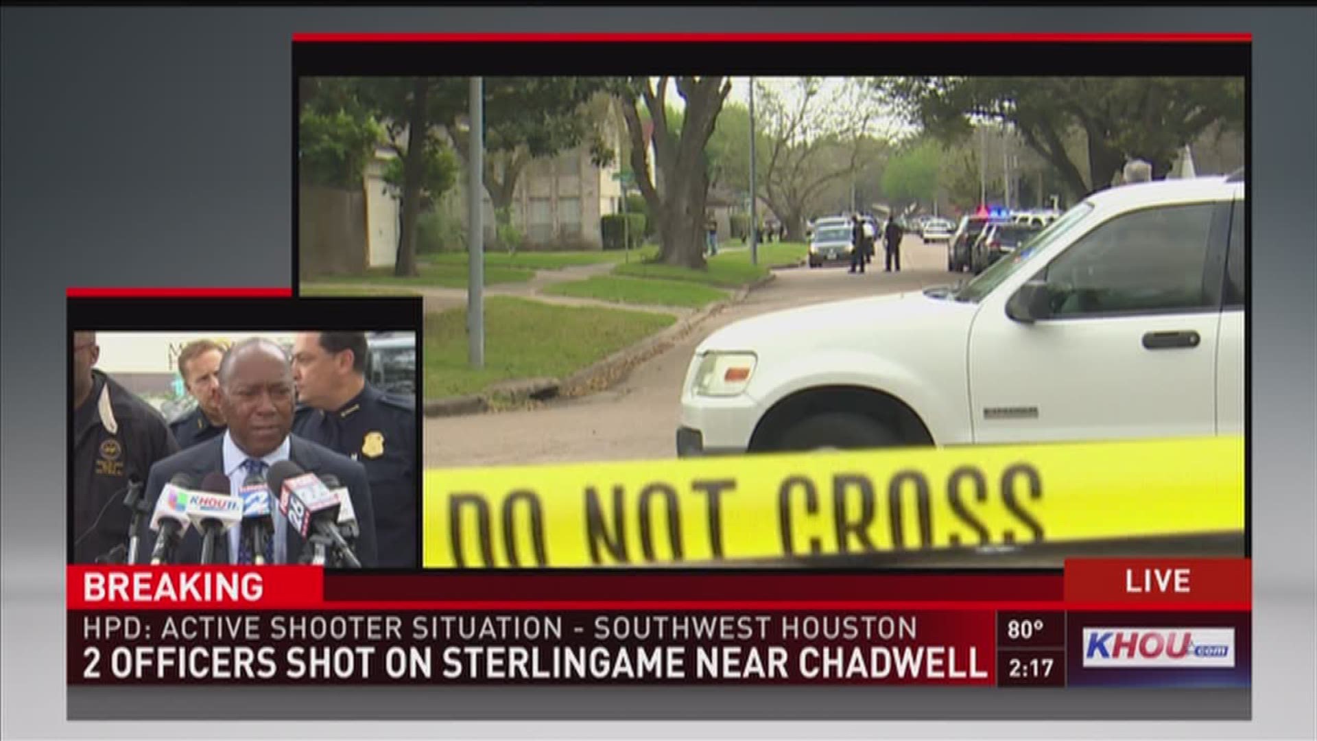 southwest Houston neighborhood where two police officers were shot earlier is on lockdown and residents are urged to stay inside and lock their doors.