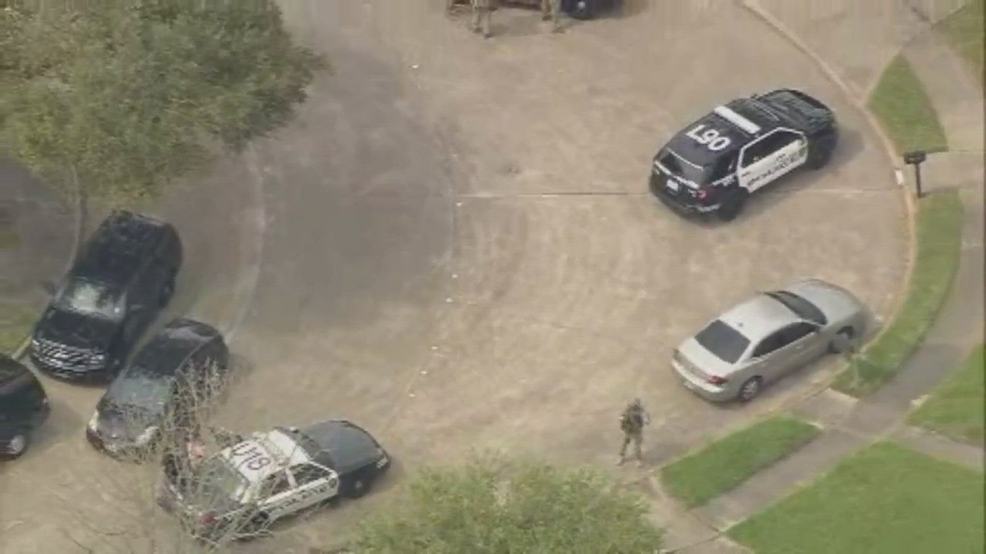 Raw video of the SWAT team that was present in a southwest Houston neighborhood where two police officers were shot on Tuesday afternoon.