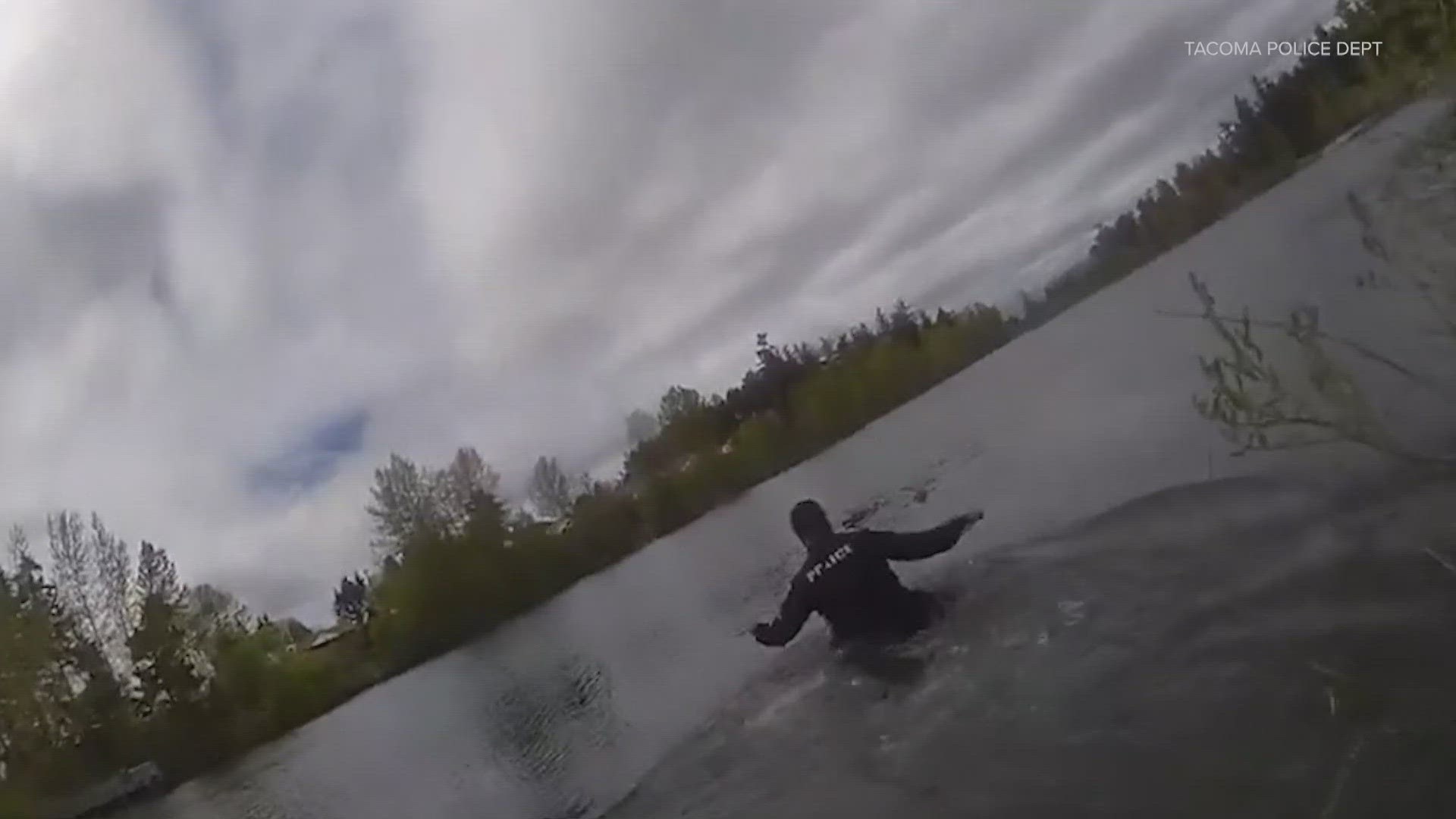 Two Tacoma police officers helped a young girl out of the water during a Monday rescue.