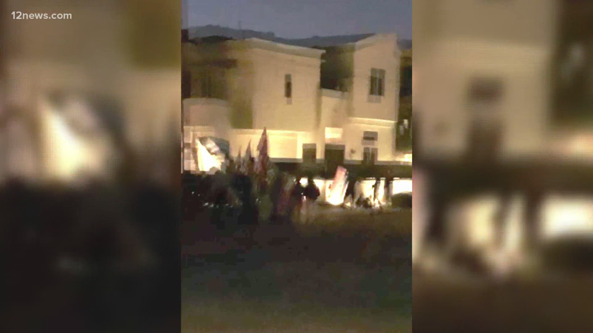Protesters went to Arizona Secretary of State Katie Hobbs' home Tuesday night. Hobbs has been the subject of death threats since the election.