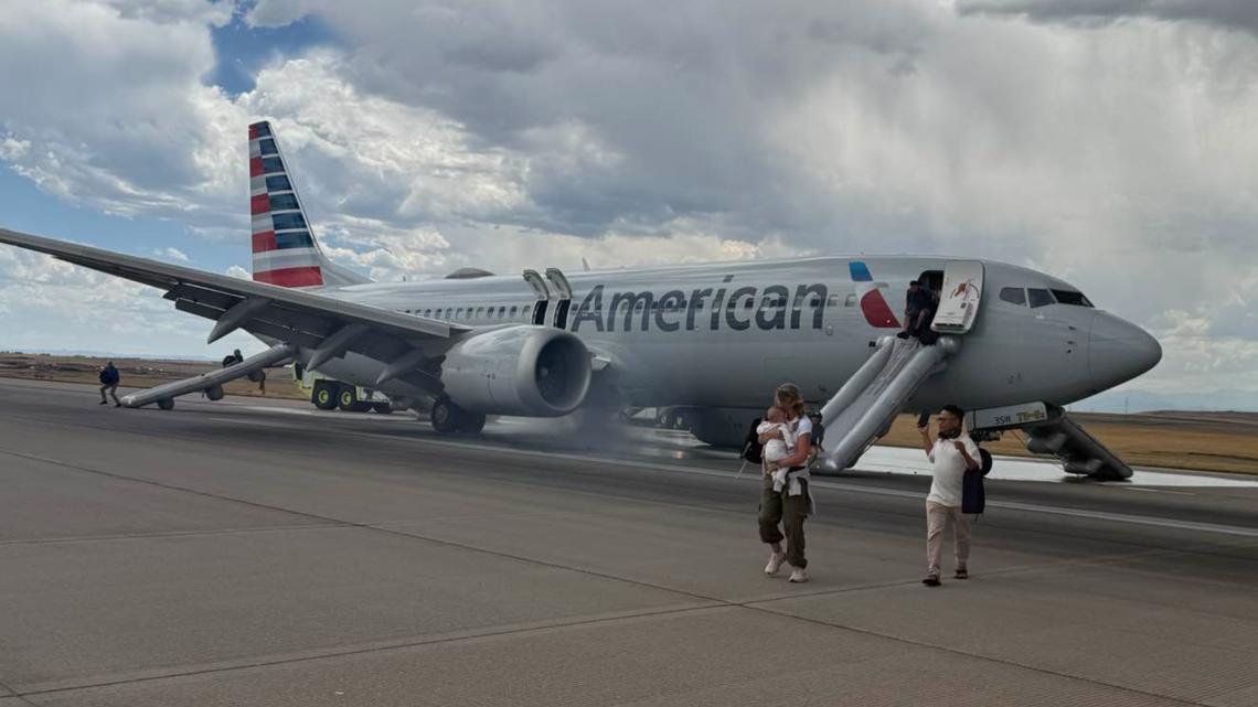 Passengers evacuated from plane at Denver airport after problem with tire