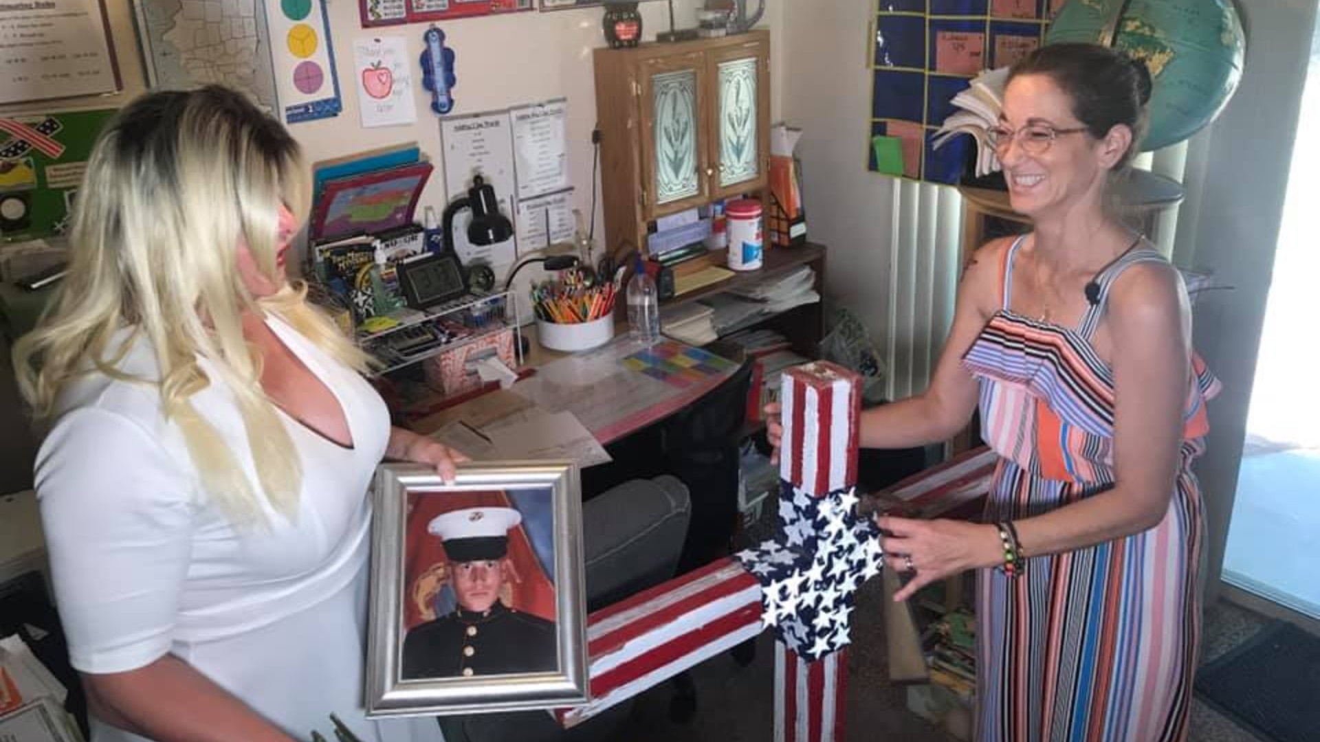 A memorial cross at-risk of being removed due to construction has been returned to the widow of a U.S. Marine veteran through the help of a community member.