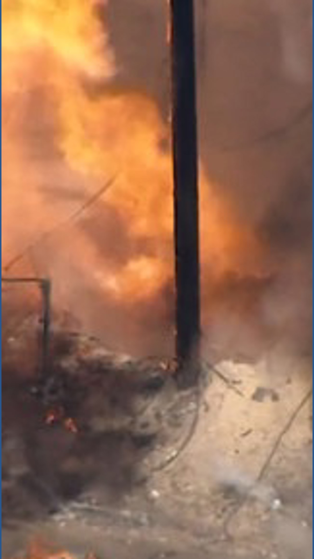 Major gas line breaks, causing huge flames to erupt from the ground ...