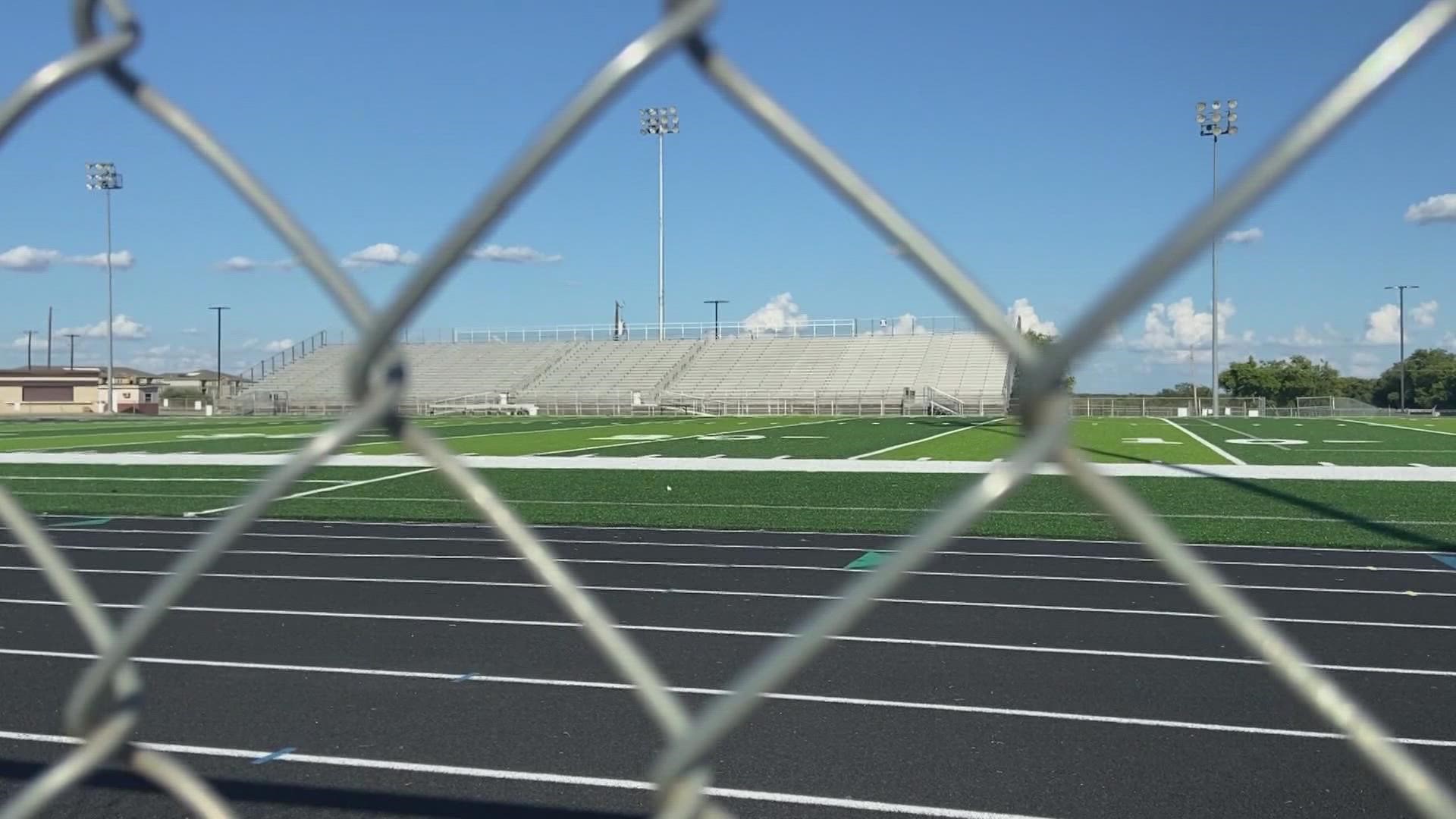 Three people were detained en route to the Everman High School homecoming game. Inside the vehicle, there was an "AR-15 pistol and a 60-round magazine."