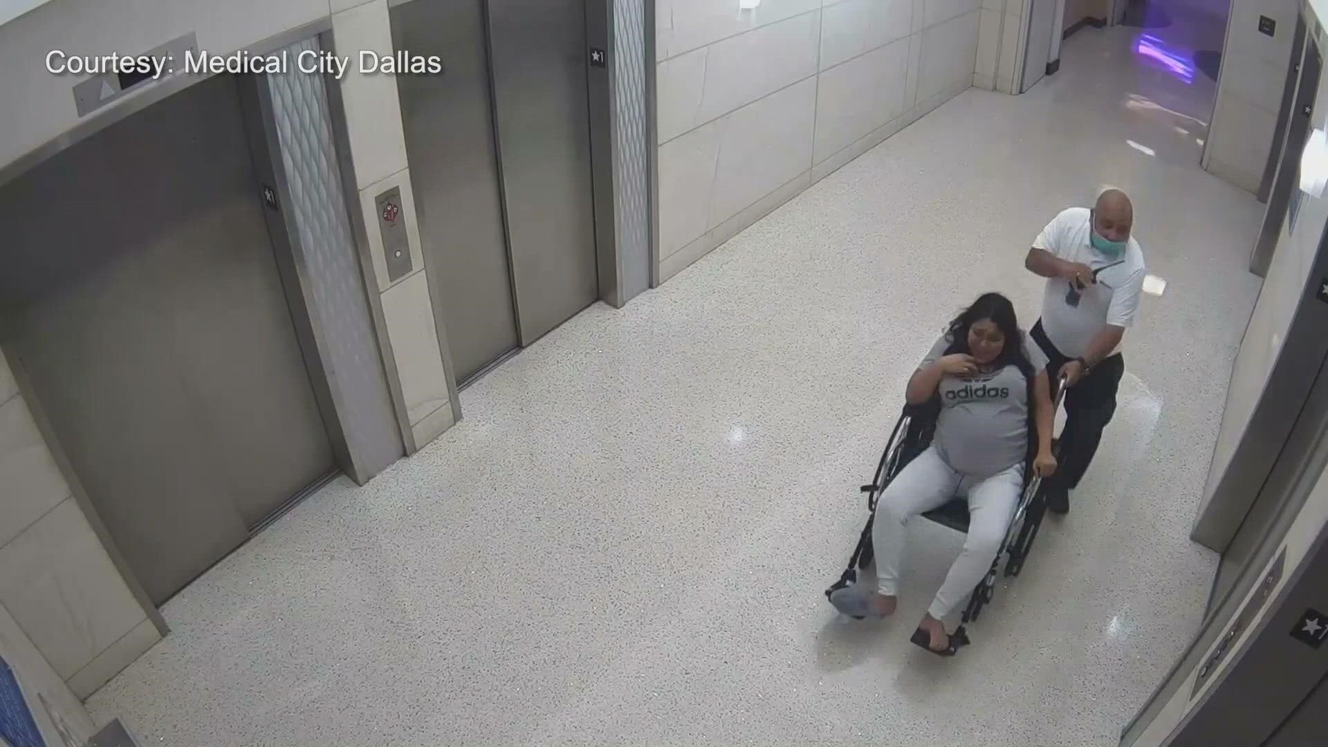 Security footage captures the guard wheeling the expecting mom into an elevator, and on the next floor, she's being wheeled out, baby in hand.