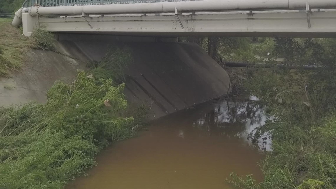 Woman dies after car possibly swept off bridge in mesquite during