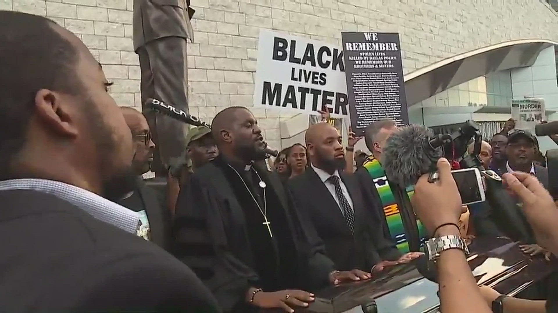 The protesters were rallying in support of Botham Jean outside of AT&T Stadium before the Cowboys-Giants game.