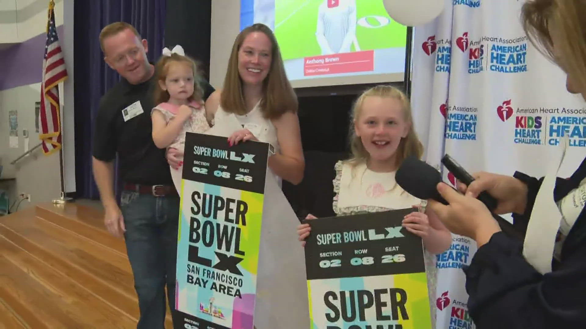 Chelsie Wood got surprised with Super Bowl tickets at Pullen Elementary School as a reward from the American Heart Association for learning hands-only CPR.