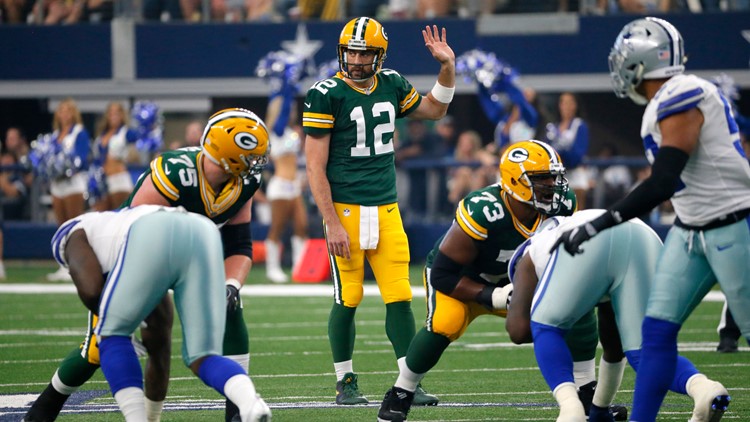 Packers quarterback Aaron Rodgers lines up against the Dallas Cowboys