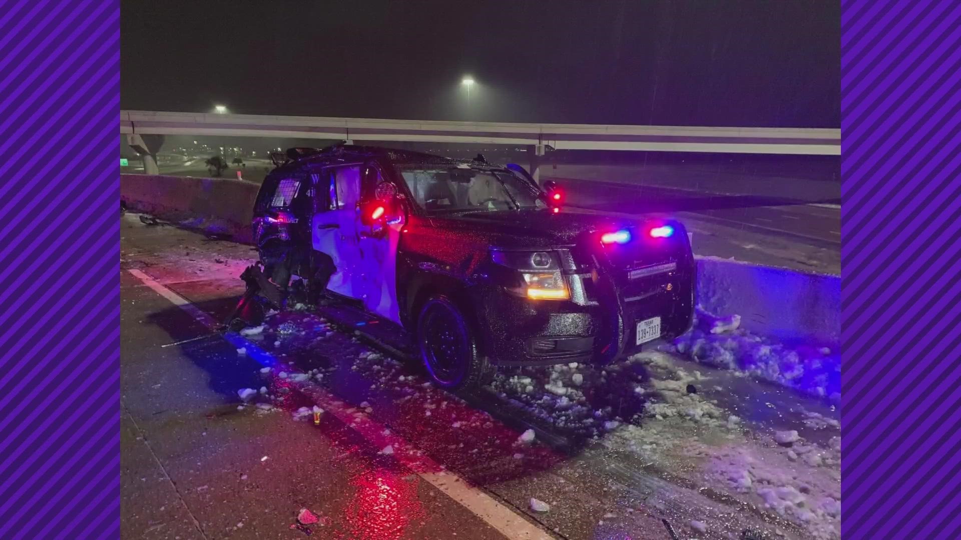 Two Fort Worth police officers are expected to be alright after a crash involving their patrol car and multiple 18-wheelers.