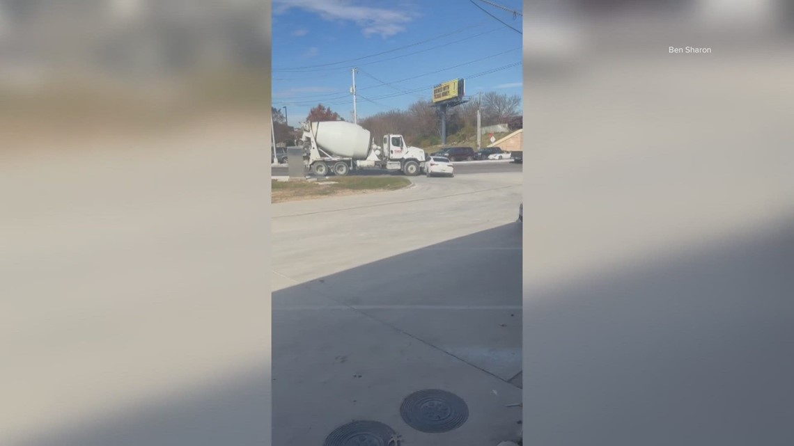 Cement truck pushes car through East Dallas intersection