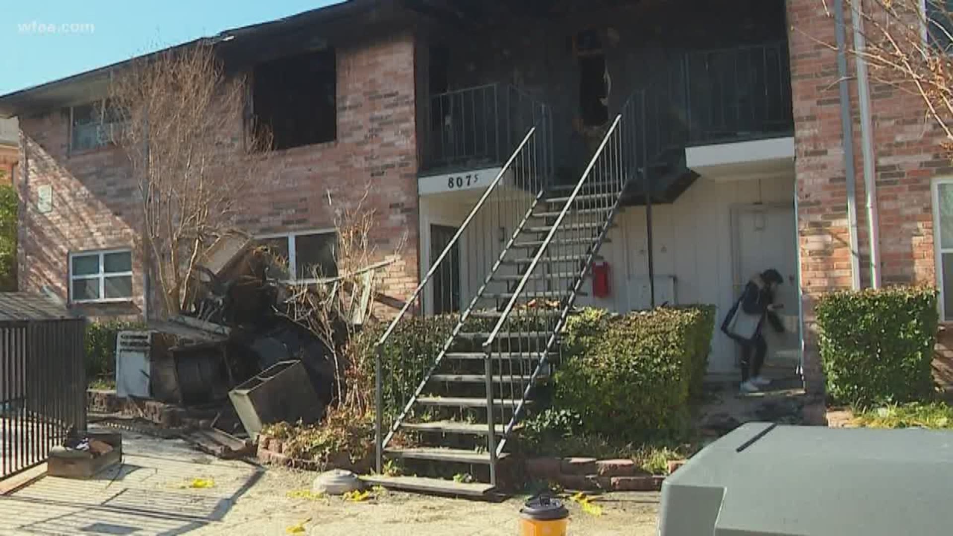 An elderly woman has died after a two-alarm apartment fire early Tuesday in northeast Dallas.