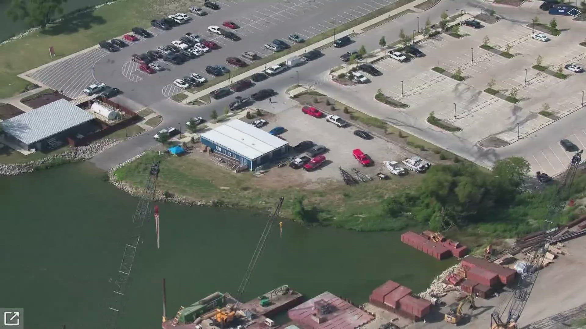 Dallas Fire-Rescue said they responded to a 911 call shortly before 8 p.m. reporting multiple people had jumped into the lake from a boat, but two didn't resurface.