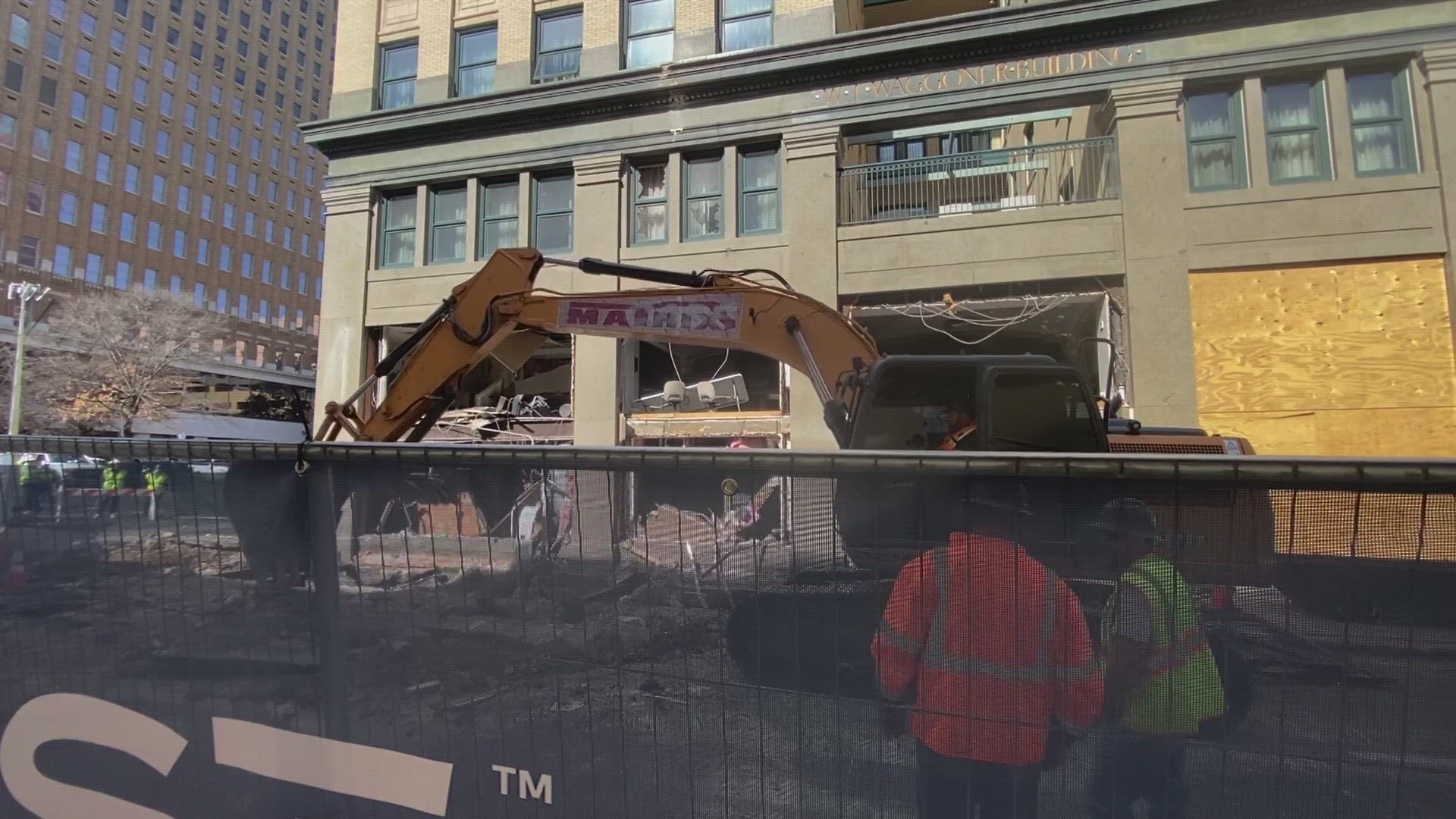 A permit granted Monday allowed workers to begin removing chunks of concrete from the Sandman Hotel site -- a critical step in determining the blast's cause.