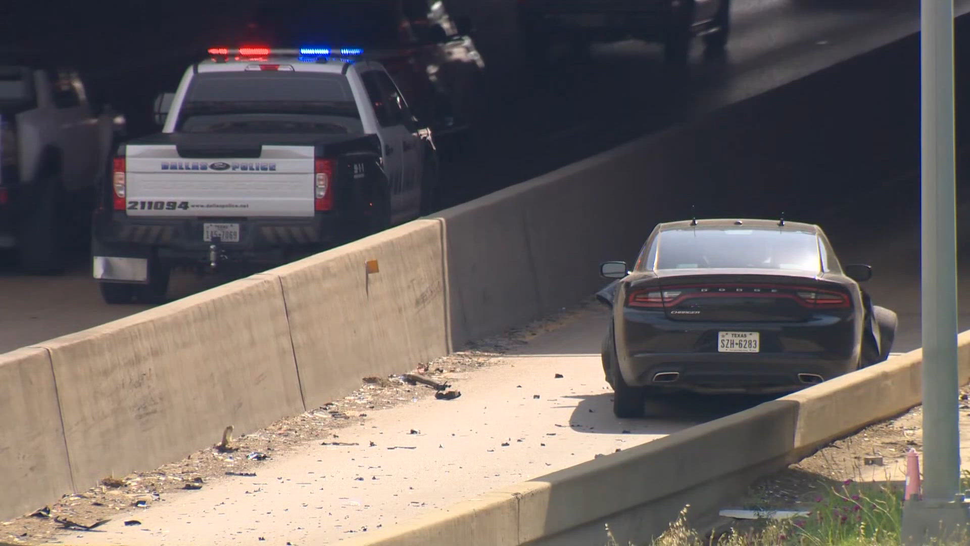 Dallas police officer walks away with minor injuries after crash along ...