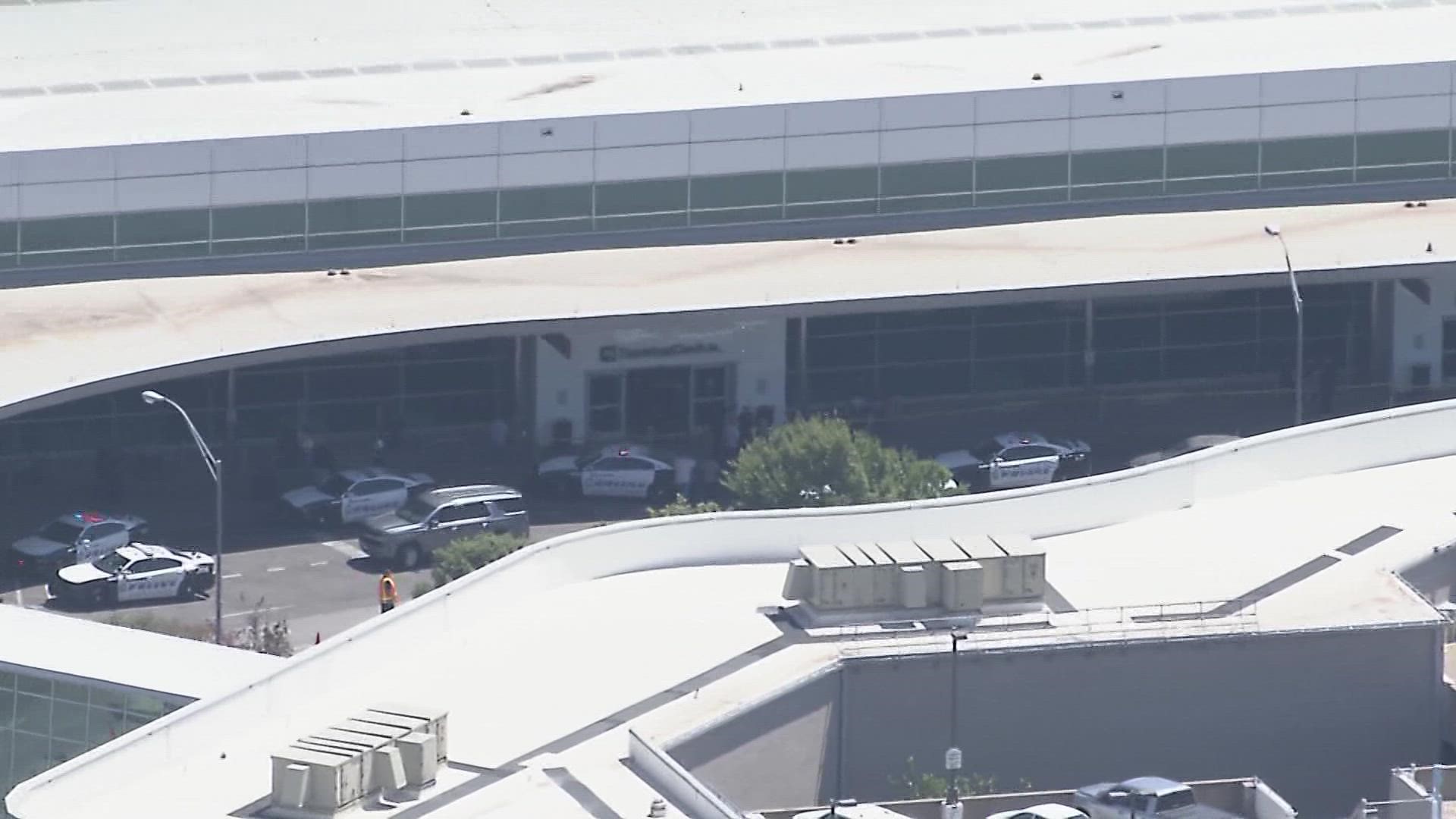 A person was shot at Dallas Love Field airport on Monday morning. Here's what we know and what we're seeing, as of noon.