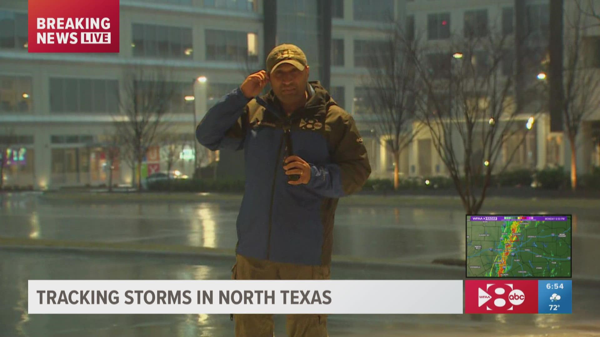 Sirens are sounding in Allen as a storm with rain and high winds approaches.