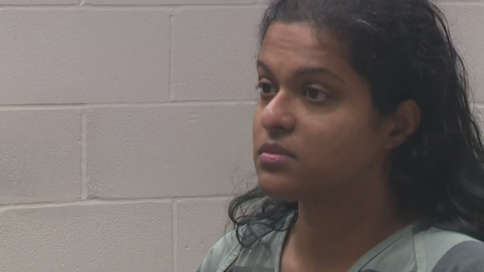 Sini Mathews appears before a judge to hear the charges brought against her.
