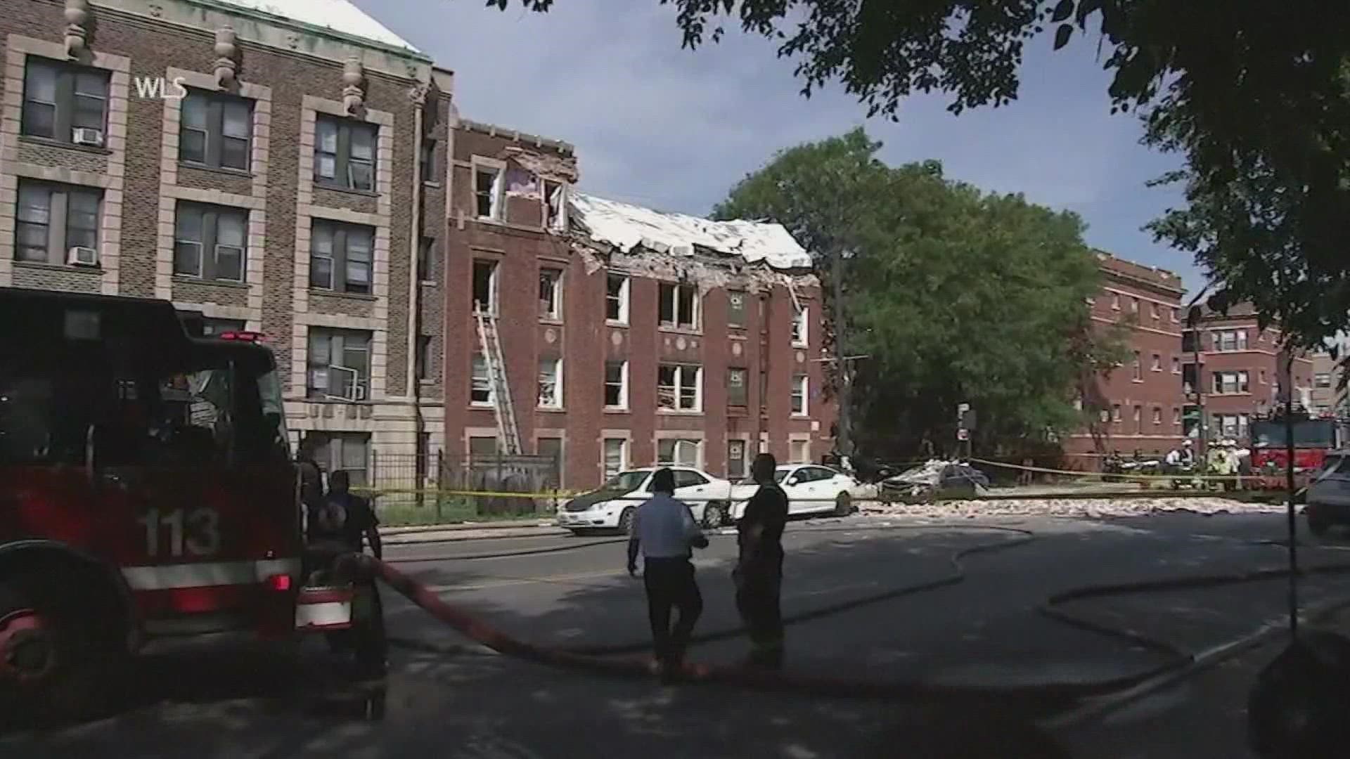 Eight people were rushed to hospitals after being injured when an explosion Tuesday tore through the top floor of a Chicago apartment building, officials said.