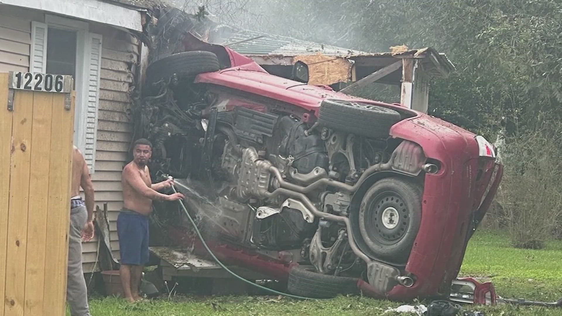 The car crashed into a house which caught on fire. 