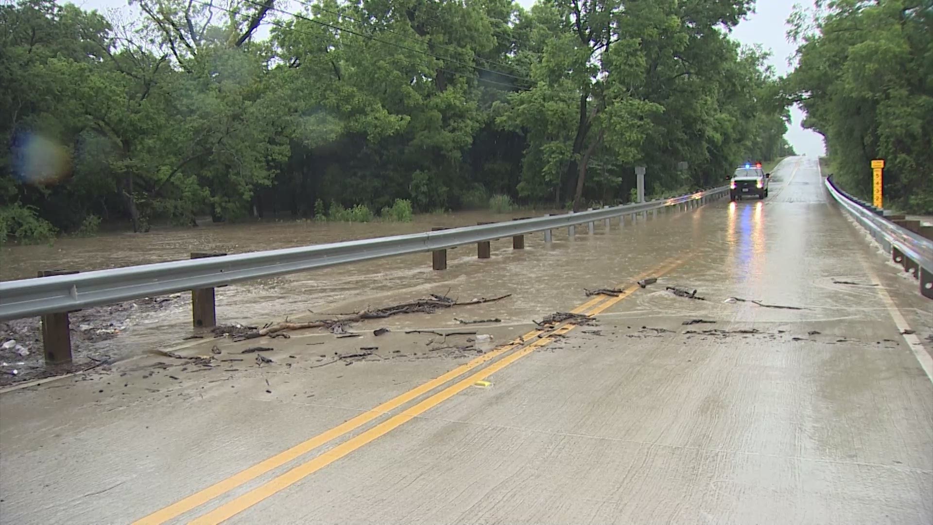 Heavy rain from Monday morning caused a roadway bridge in Southlake to flood.
