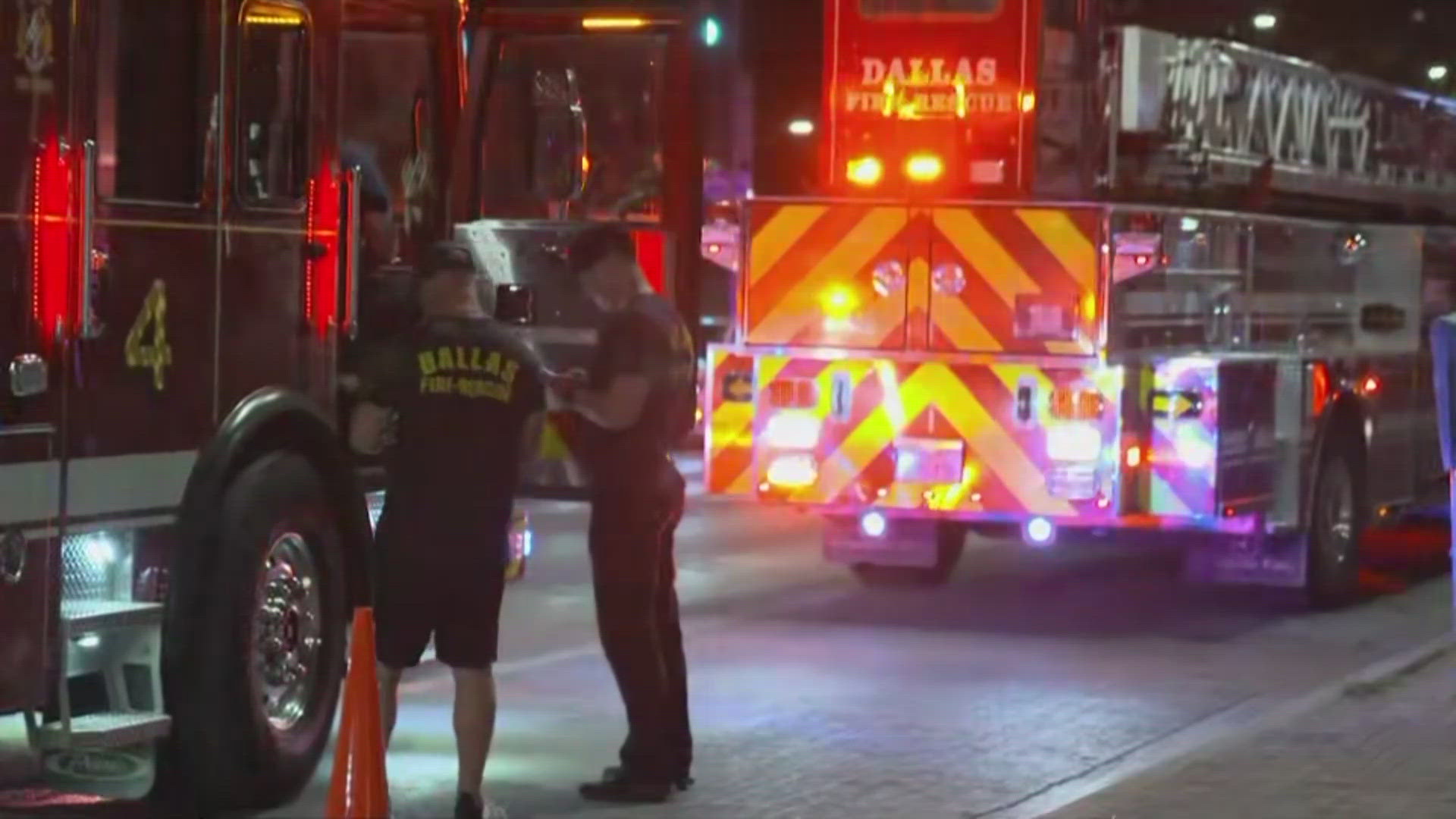 According to Dallas Fire Rescue, passengers are being transferred from the elevator in small groups.