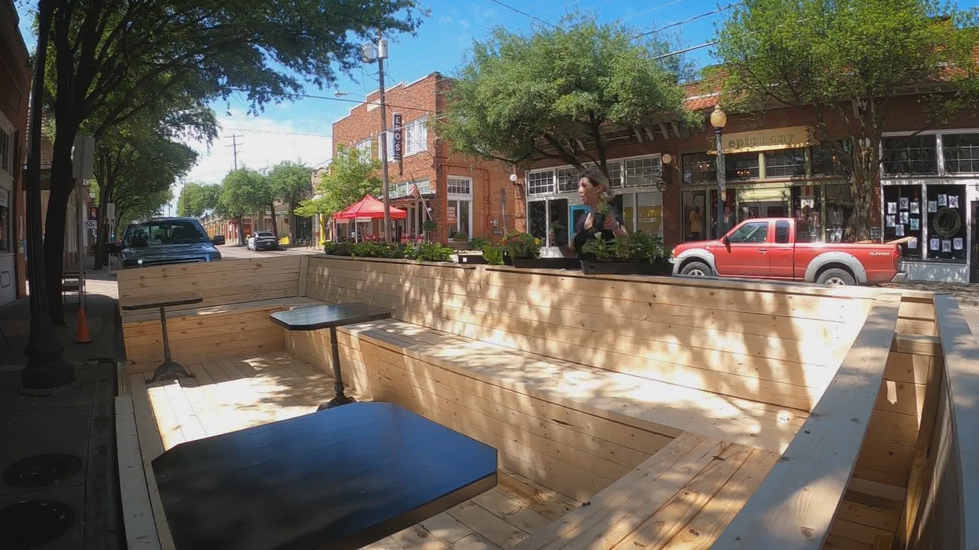 A deck-like structure extended off the sidewalk could provide more outdoor seating options in areas across Dallas, if City Council approves.