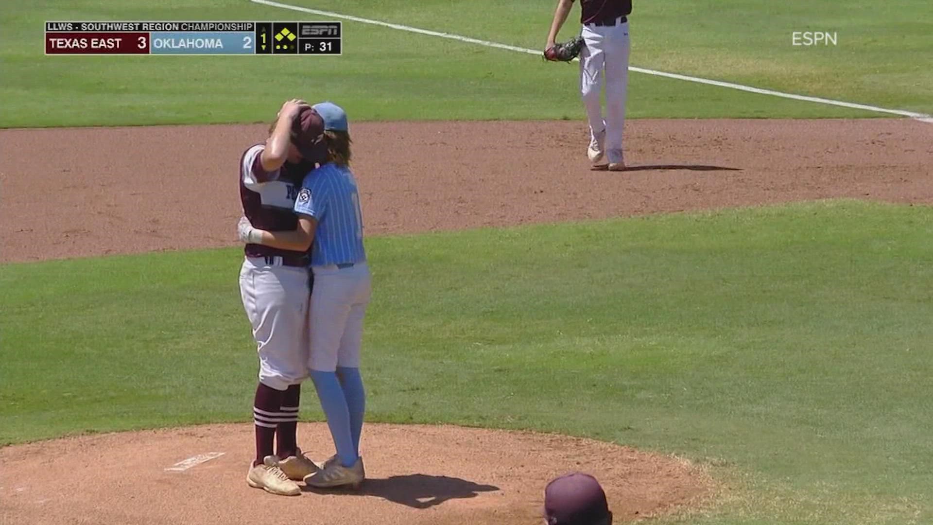 After the errant pitch, Kaiden Shelton stood on the mound, in tears over what happened. Isaiah Jarvis walked over and put his arms around Shelton.