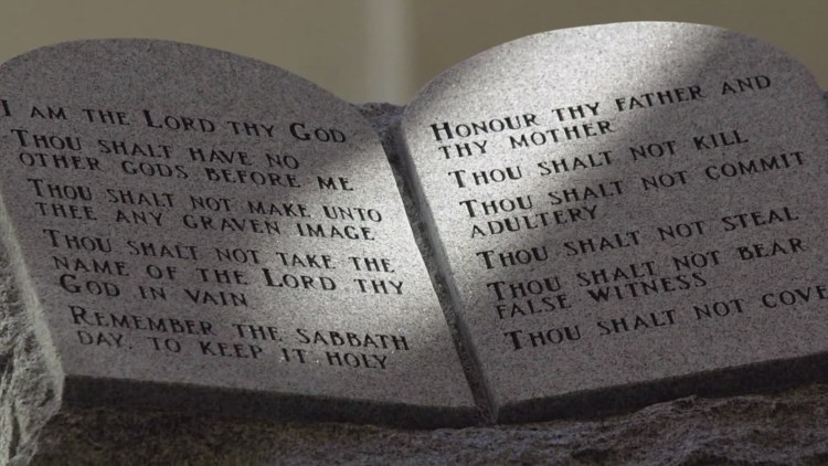 Activist challenges Texas law with Ten Commandments posters | wfaa.com