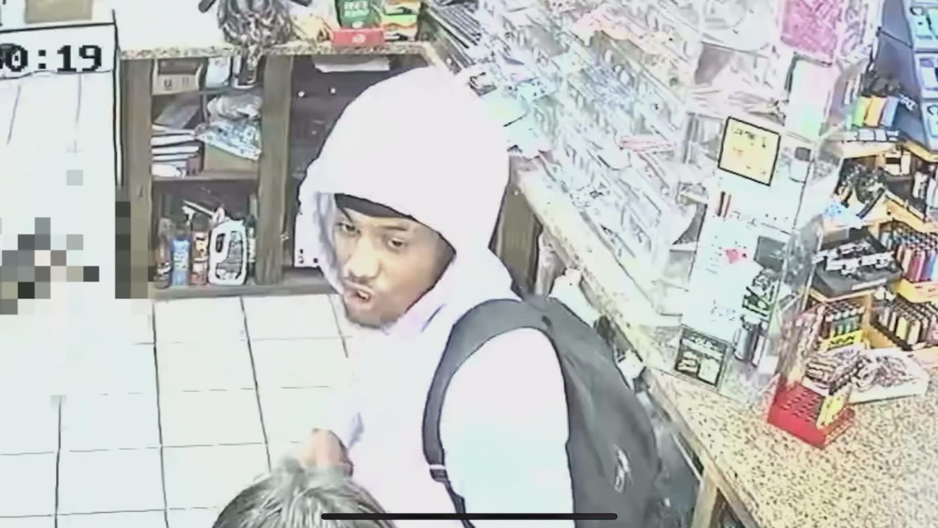 FWPD says surveillance video captured the moment the suspect began his attempt to get to the cash register and was confronted by the employee’s dog named Peanut.