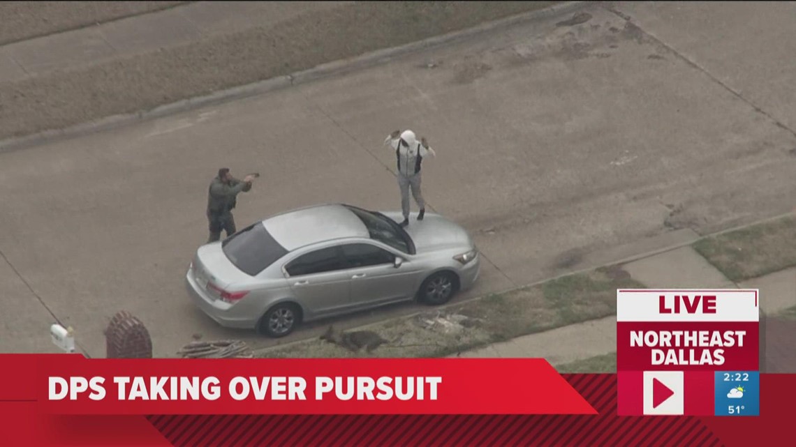 Police chase: police officer chasing a car with a paper tag