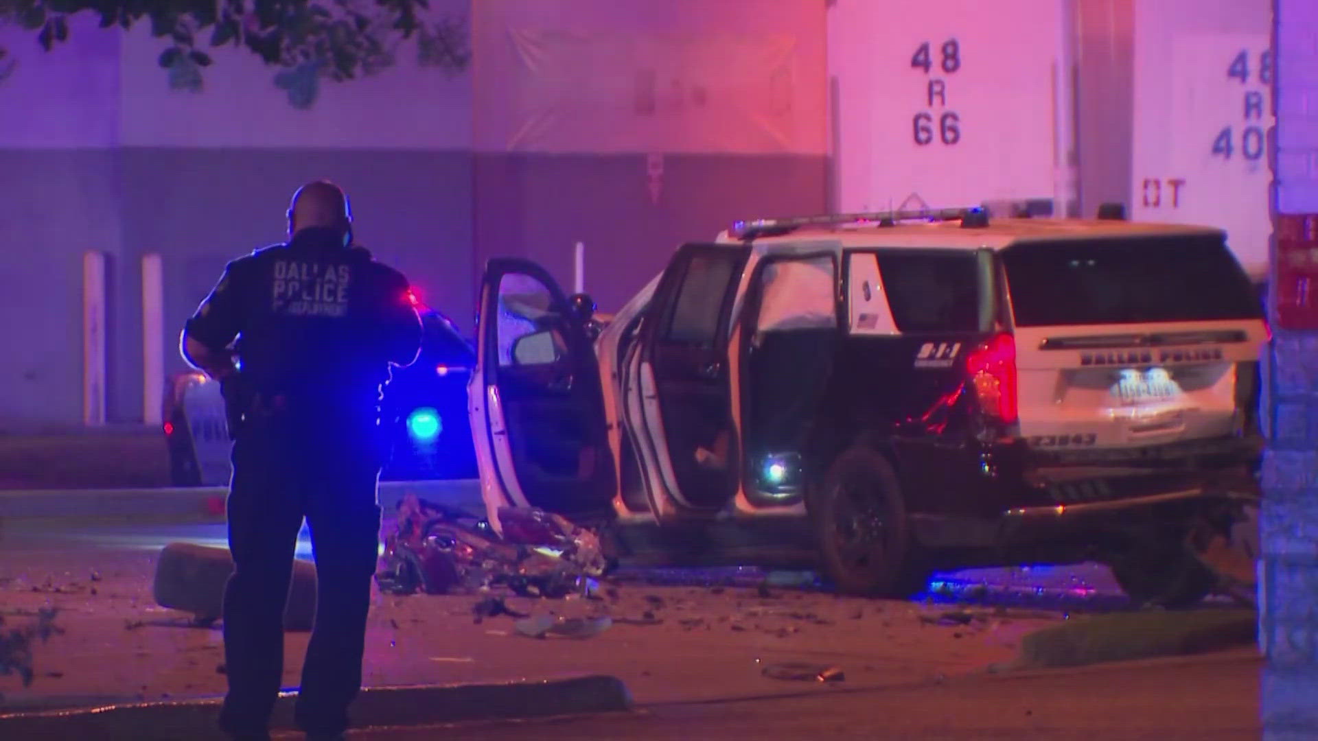 Two police officers were injured in the overnight crash.