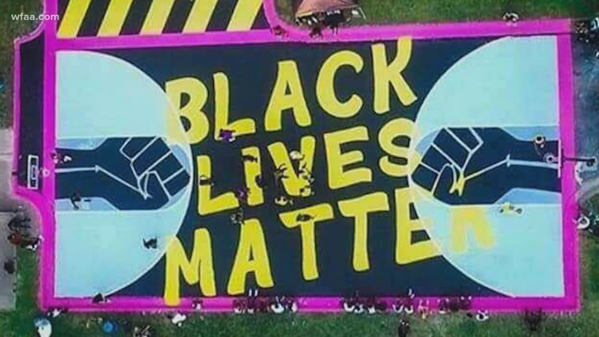 A basketball court at an apartment complex in the Highland Hills community of southern Dallas has been transformed into a Black Lives Matter mural.