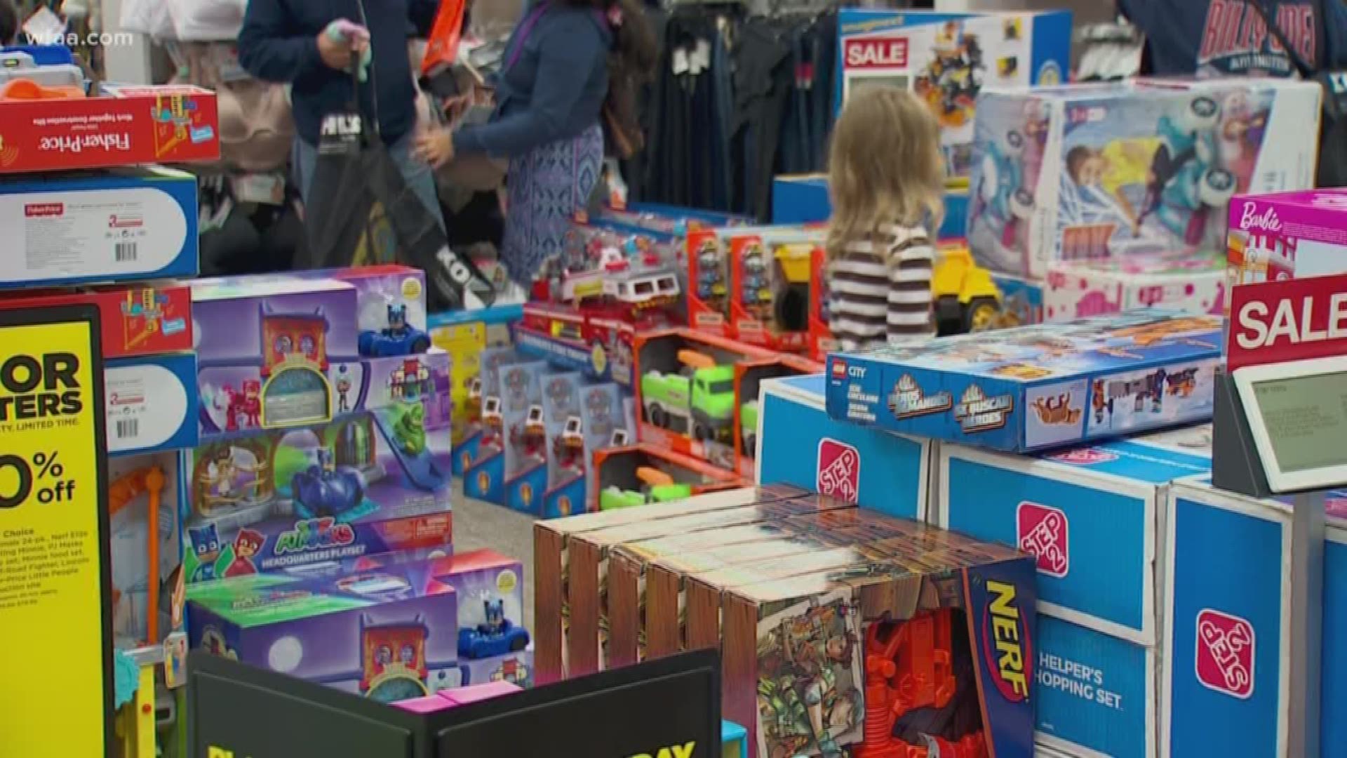 "We want to get that TV": Heavily marked down electronics, only available in-store, will keep crowds heading to many big-box retailers this holiday shopping season.