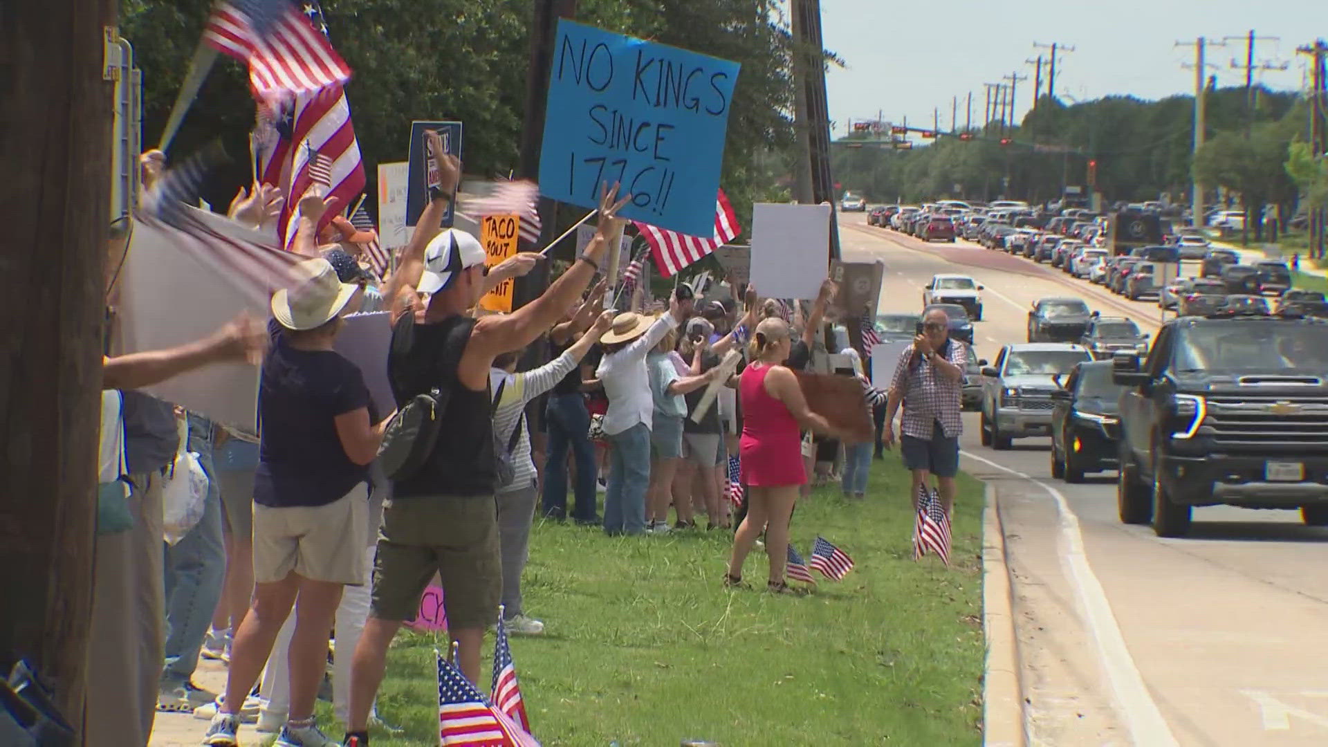 Both sides of FM 423 were crowded with hundreds of protesters.