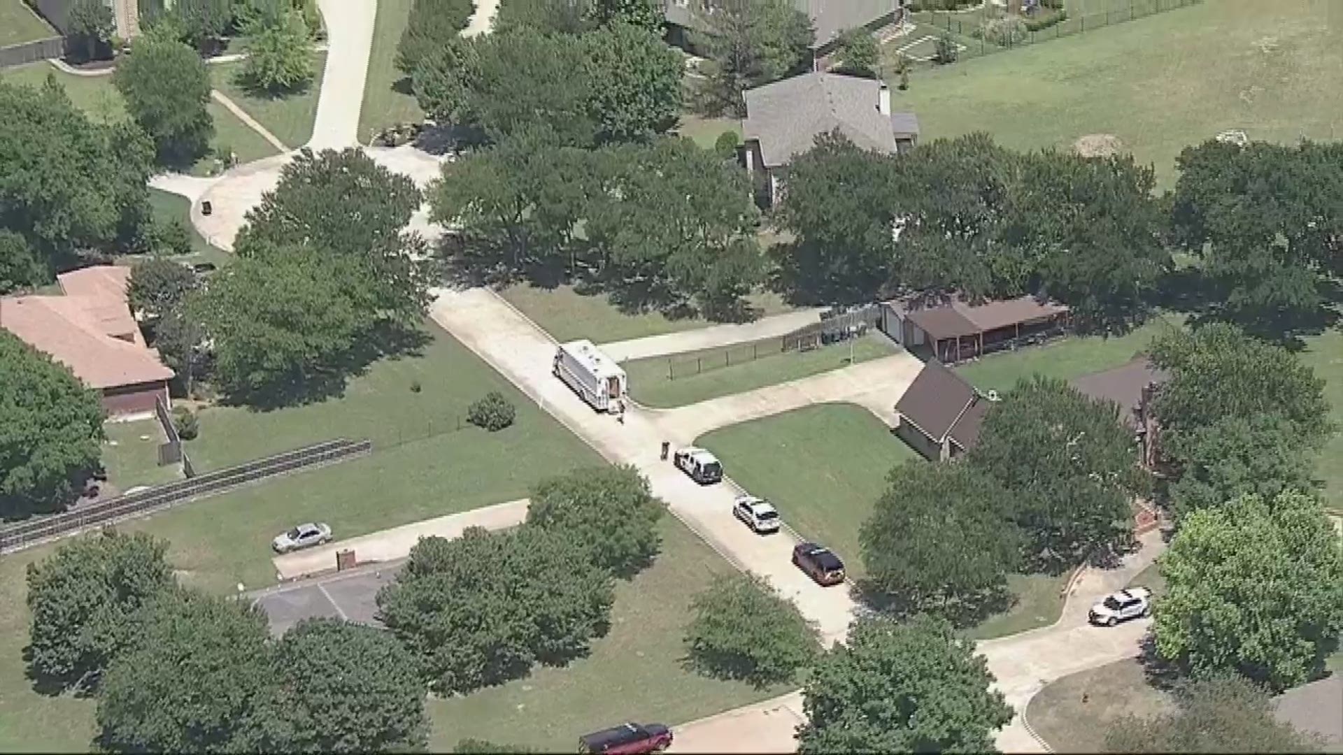 Plano PD bomb squad at the home where dynamite was found Thursday in Melissa.
